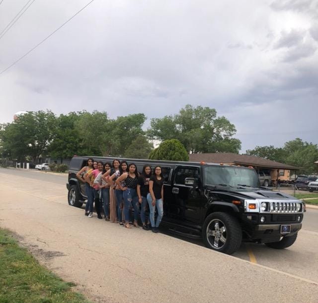 Birthday party group with the Hummer limousine
