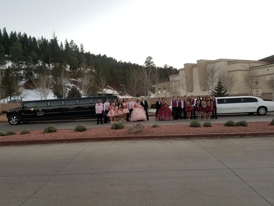 Quinceañera party with both Hummer and Lincoln limos in the mountains