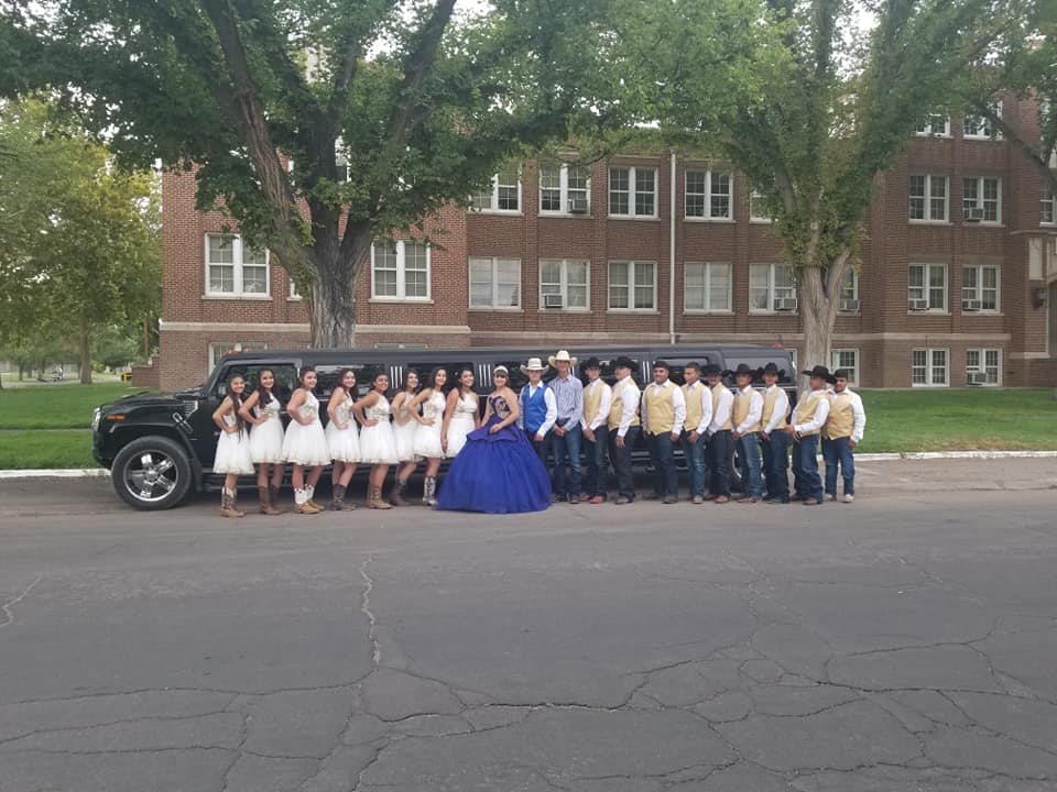 Quinceañera court in white and gold with the Hummer limo